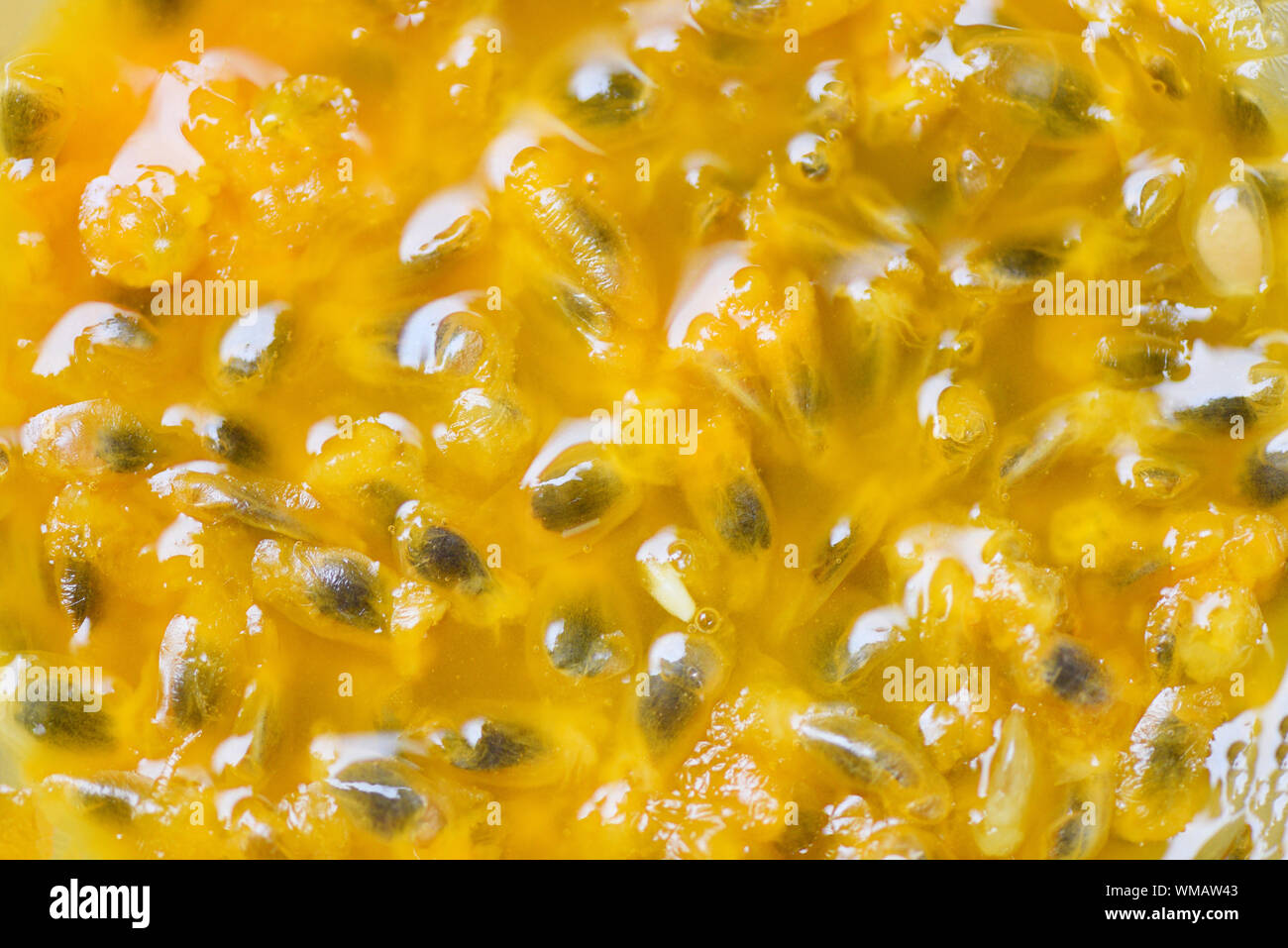 Passion Fruit Juice Nahaufnahme Textur für Hintergrund/Passion Fruit Smoothie Stockfoto