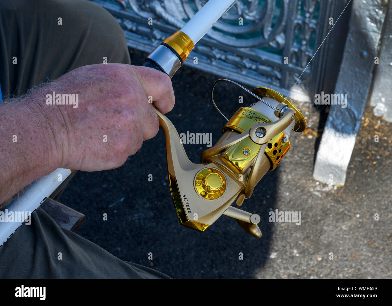 8 BB Kugellager Spinning Reel SC 7000 von Yumoshi close up in South Parade Pier, Portsmouth. Stockfoto