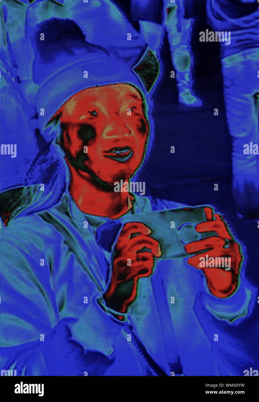 Infrarot Imaging mit einem Flir Wärmebildkamera auf Display erfasst, mit animierten zeigt den Teilnehmern, auf der CES (Consumer Electronics Show), Las Vegas, NV, USA Stockfoto