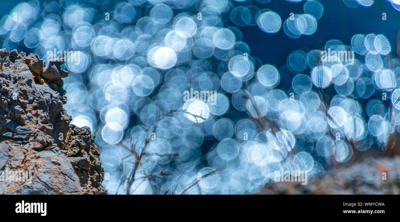 Bokeh Hintergrund der Sonne Reflexionen im Meer. Kreise Stockfoto Bokeh Hintergrund der Sonne Reflexionen im Meer. Kreise Stockfoto