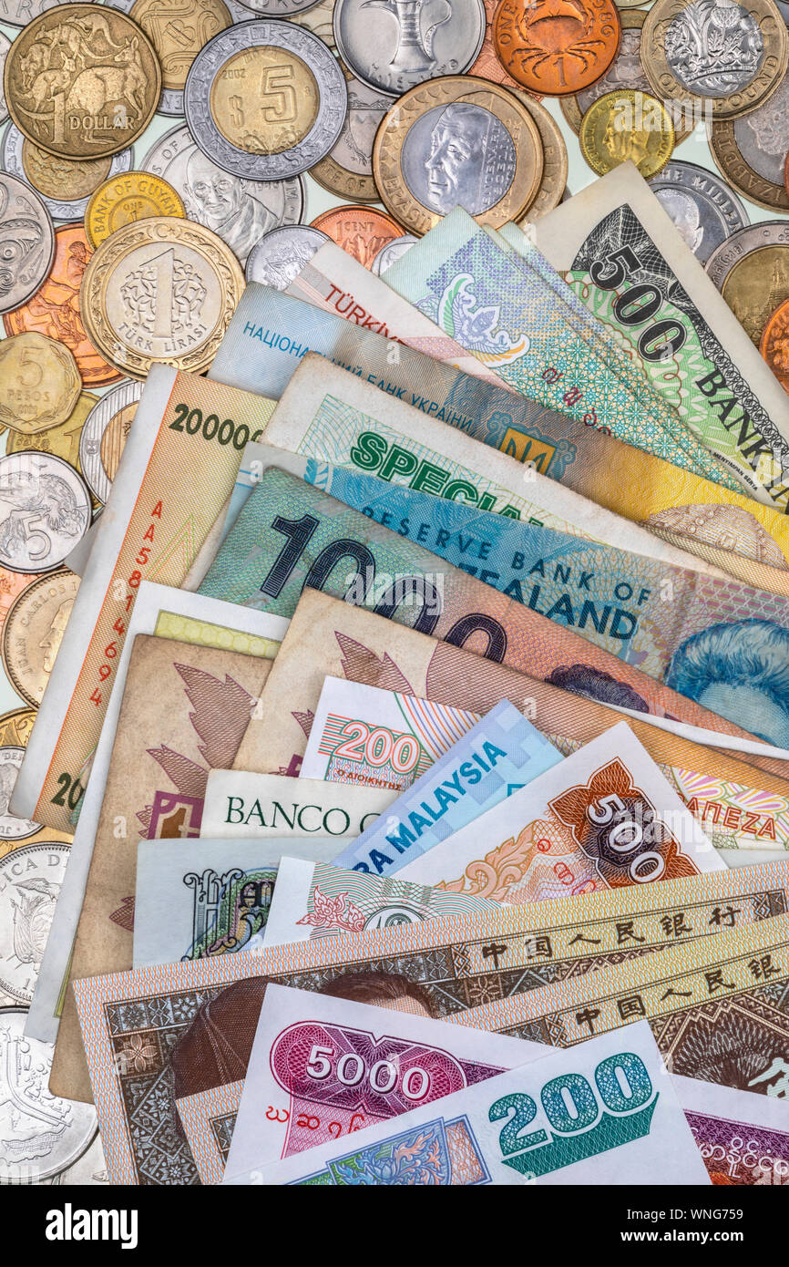 Internationale Währung - Banknoten und Münzen aus der ganzen Welt. Stockfoto