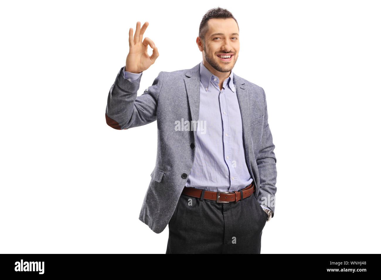 Junge fröhliche Mann in formelle Kleidung, Gestik perfekt mit Fingern auf weißem Hintergrund Stockfoto