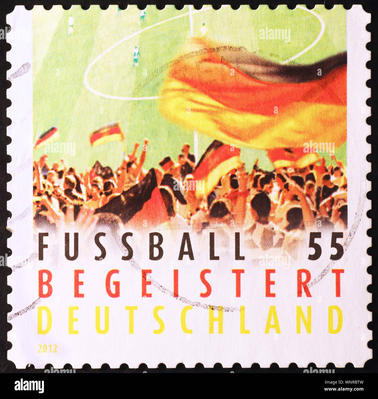 Spiel der deutschen Fußballmannschaft auf Briefmarke Stockfoto
