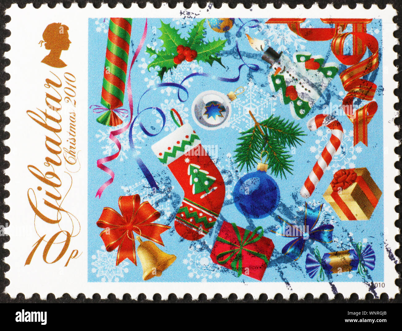 Weihnachten Symbole auf Briefmarke von Gibraltar Stockfoto