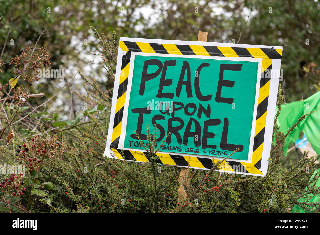 Friede über Israel Plakat bei Defence and Security Equipment International DSEI arme Fair Trade Show, ExCel, London, UK Stockfoto