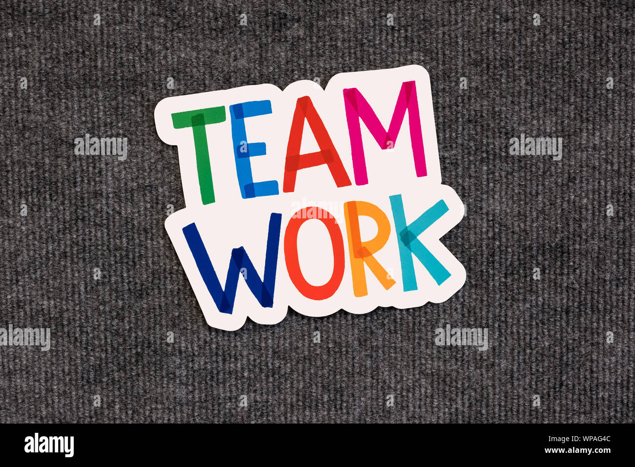 Team Arbeit Wörter auf der Tafel mit bunten Alphabete. Stockfoto