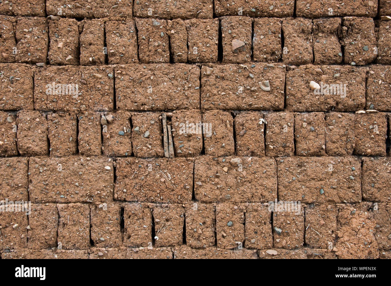 Adobe oder Mud brick wall in Baisha, Lijiang, Yunnan, China Stockfoto