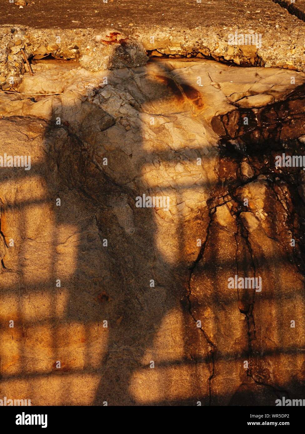 Schatten der Person auf den Felsen Stockfoto