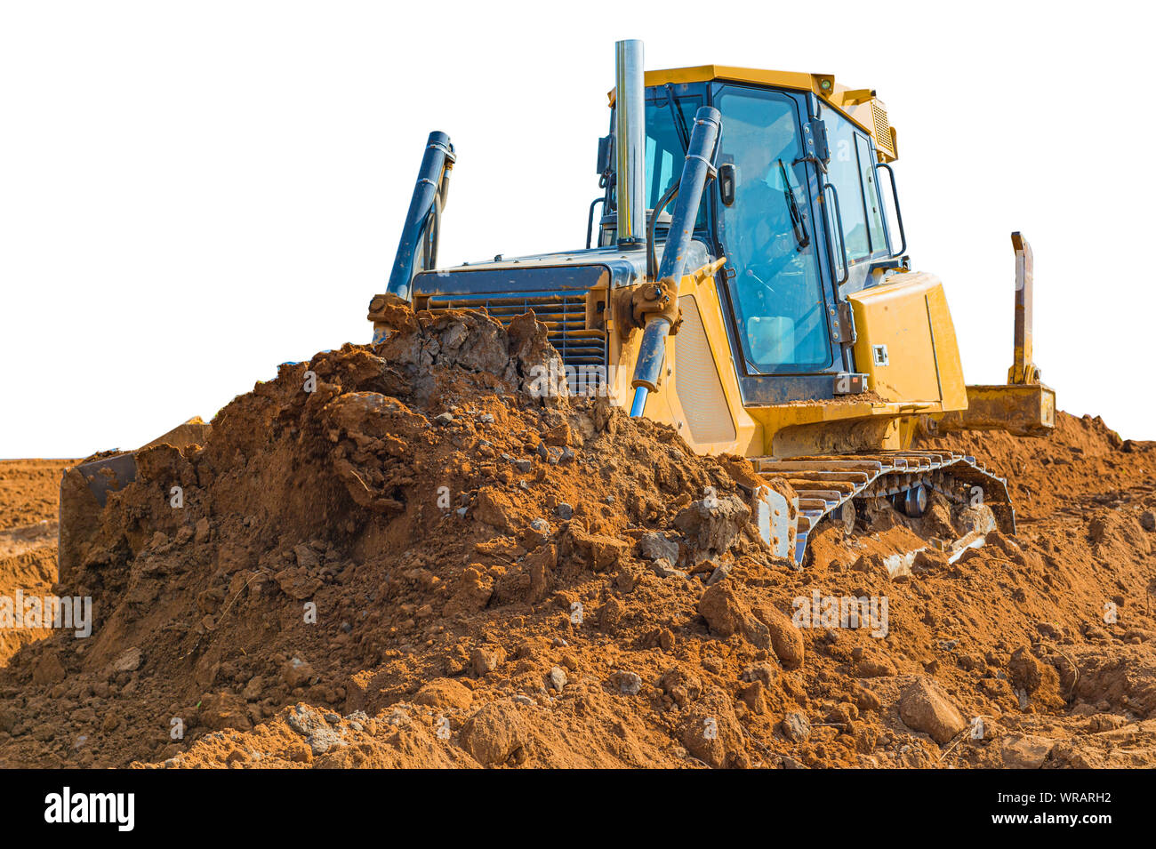 Gebrauchte Planierraupe - Bagger mit Beschneidungspfaden auf weißem Hintergrund. die Arbeiten auf der Baustelle oder Sandkasten. Stockfoto