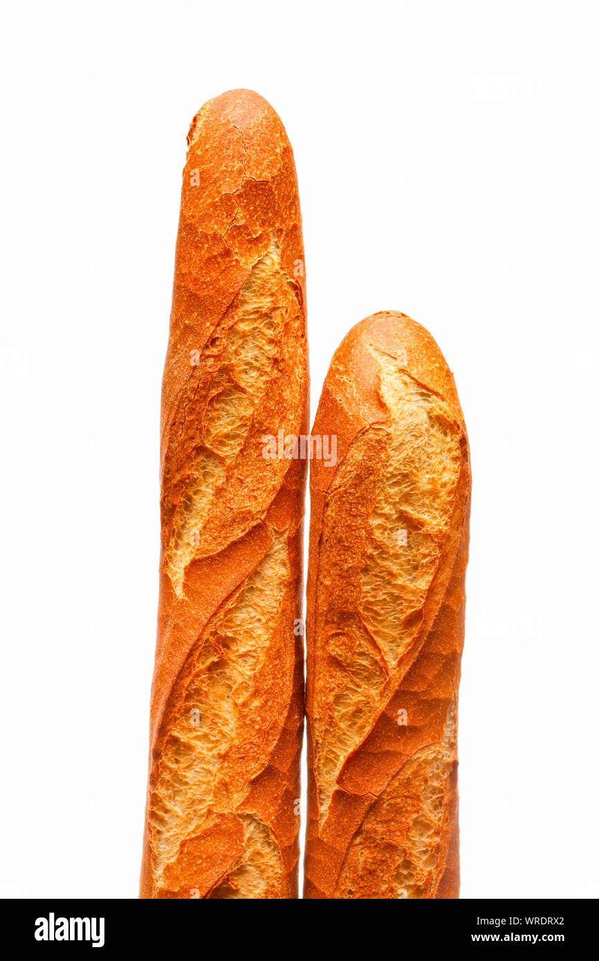Zwei französische Baguettes auf einem weißen Hintergrund, in der Nähe Stockfoto