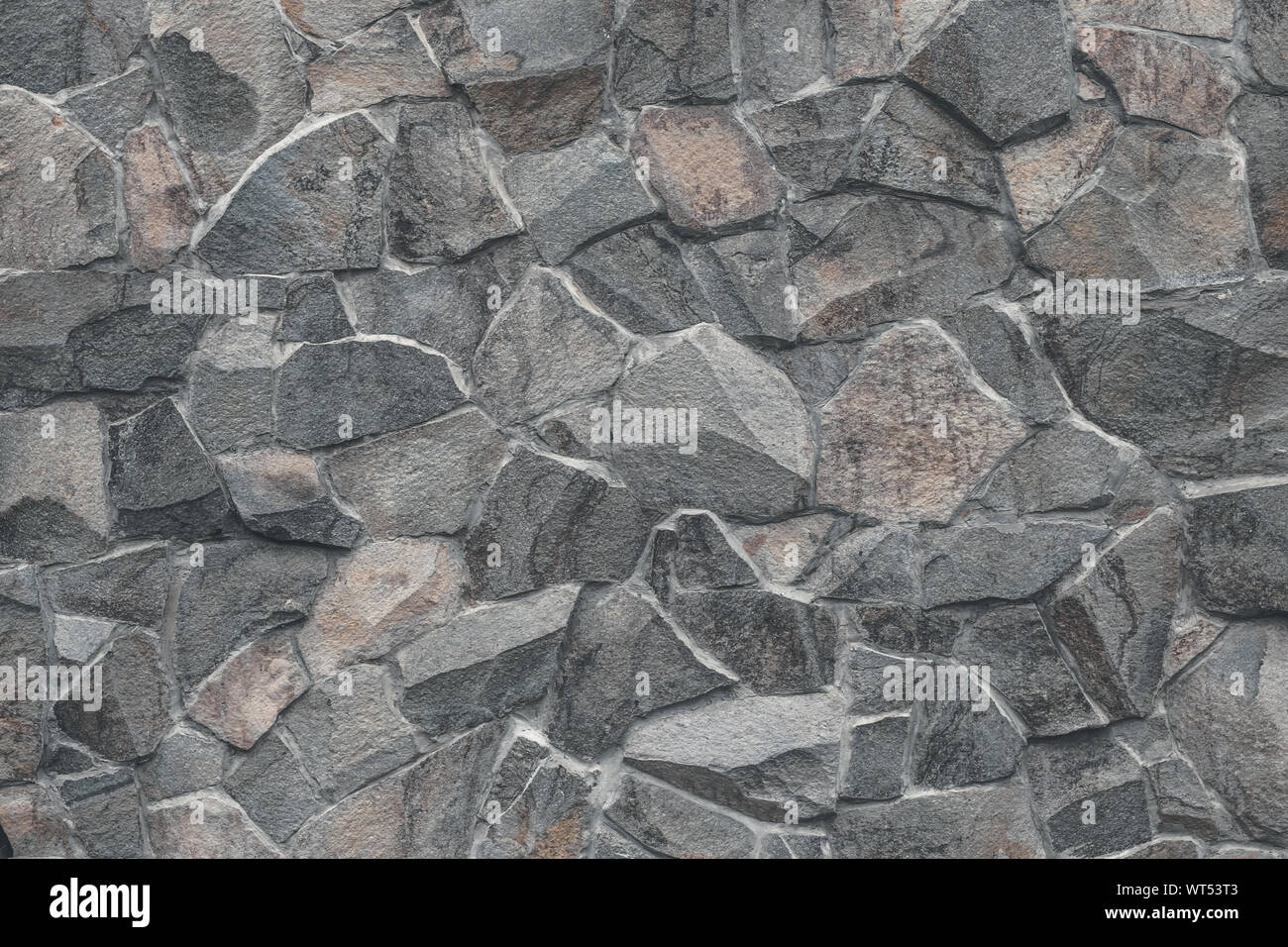 Steinmauer Hintergrund. Moderne Papier Design. Grunge Stock auf die Straße. Rock natürliche Straße. Mauerwerk raue Oberfläche, modernes Design. Graue Ziegel, natürlichen Patt Stockfoto