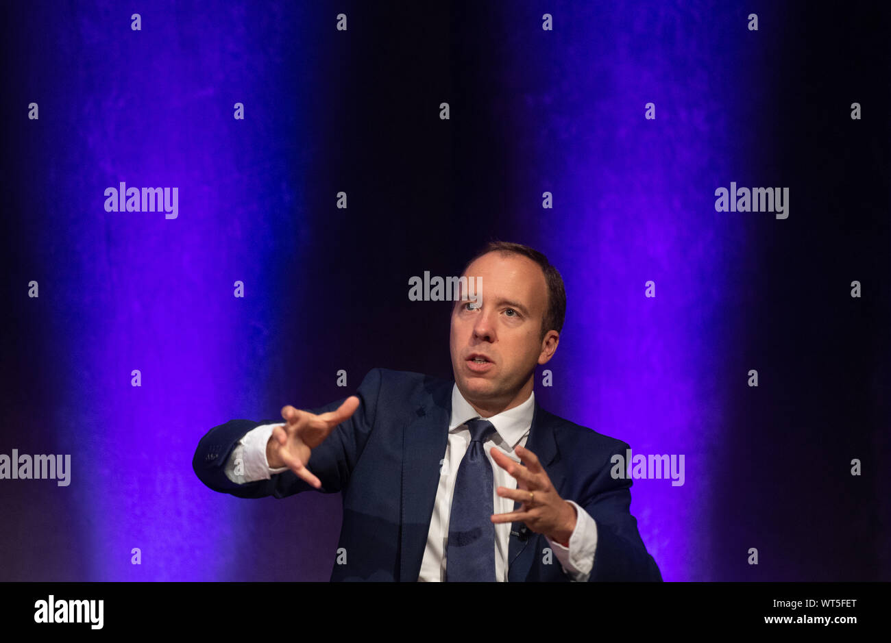 Gesundheit und Soziales Sekretärin Matt Hancock gibt eine Rede während der öffentlichen Gesundheit England jährliche Konferenz an der Universität von Warwick in Coventry. PA-Foto. Bild Datum: Mittwoch, September 11, 2019. Pläne pension Regeln zu ändern, damit die NHS Consultants und GPs mehr Stunden ohne grossen Rechnungen zu arbeiten, sind von der Gesundheit Sekretärin eingestellt. Siehe PA Geschichte Gesundheit Renten. Photo Credit: Joe Giddens/PA-Kabel Stockfoto