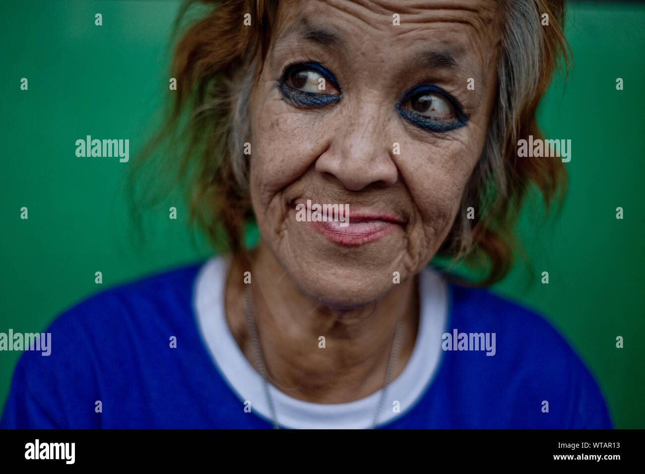 Make-up-Artist in den Straßen von Bangkok. Stockfoto