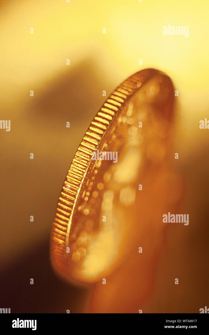 Nahaufnahme einer Goldmünze Stockfoto