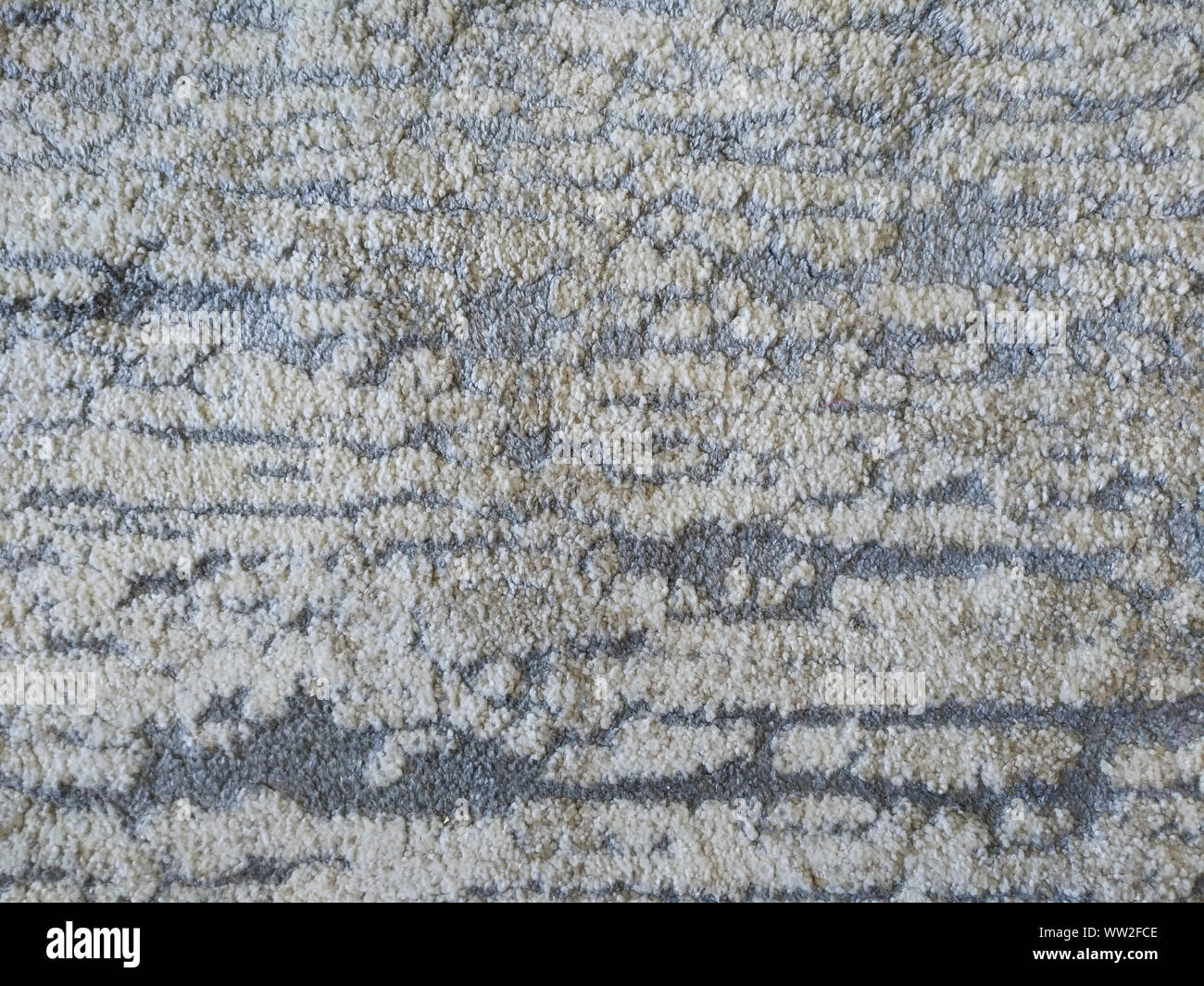 Fleckige Muster eines synthetischen Teppich Stockfoto