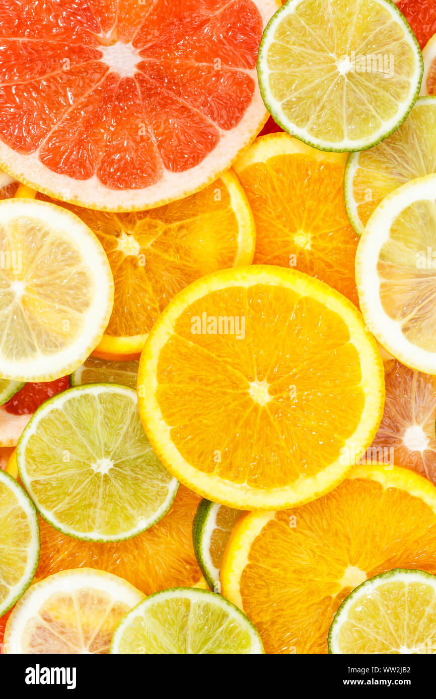 Zitrusfrüchte Sammlung essen Hintergrund Orangen Zitronen Limonen Hochformat Grapefruit frisches Obst Hintergründe Stockfoto