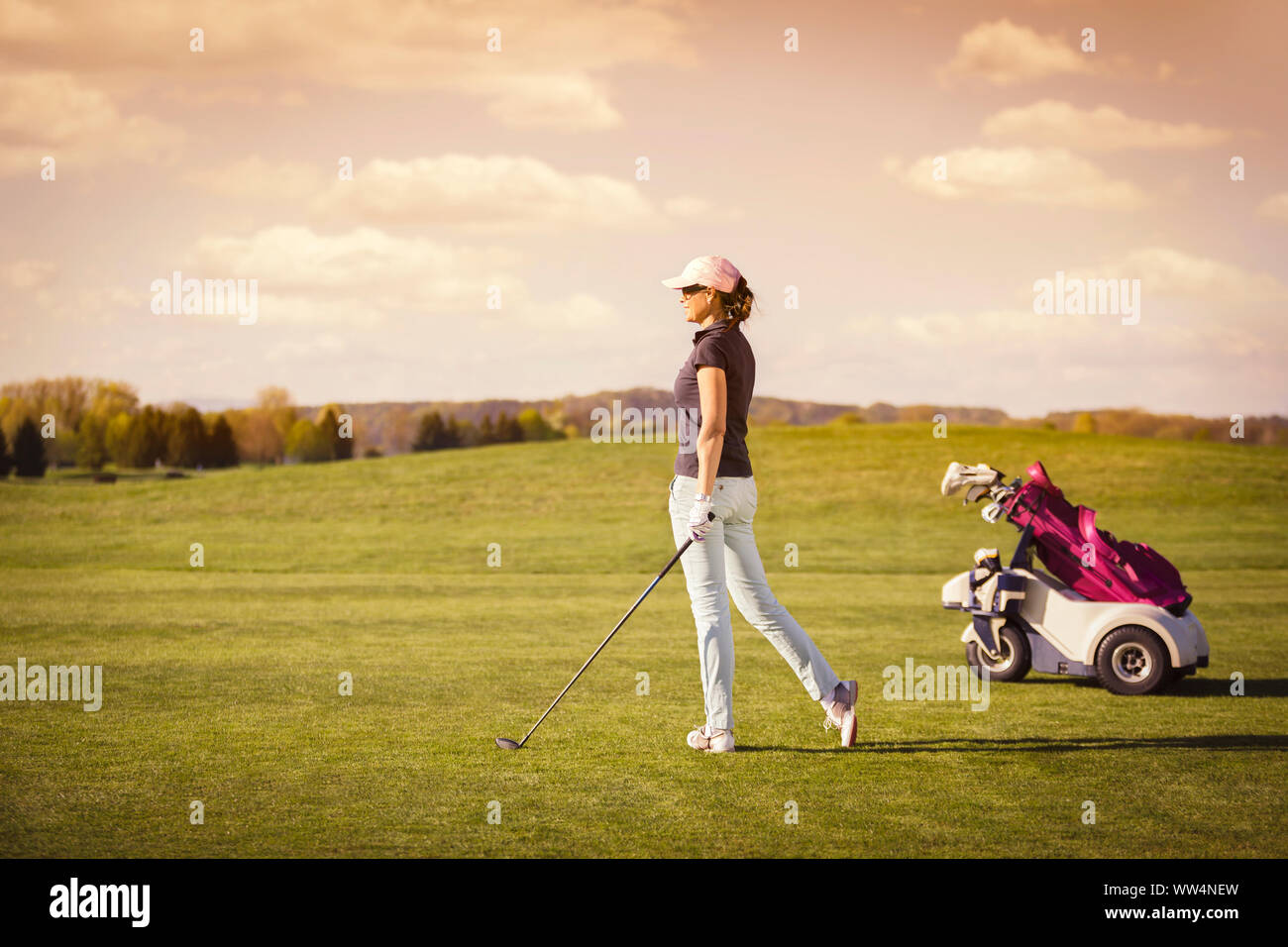 Frau Golf Spieler mit Copyspace. Stockfoto