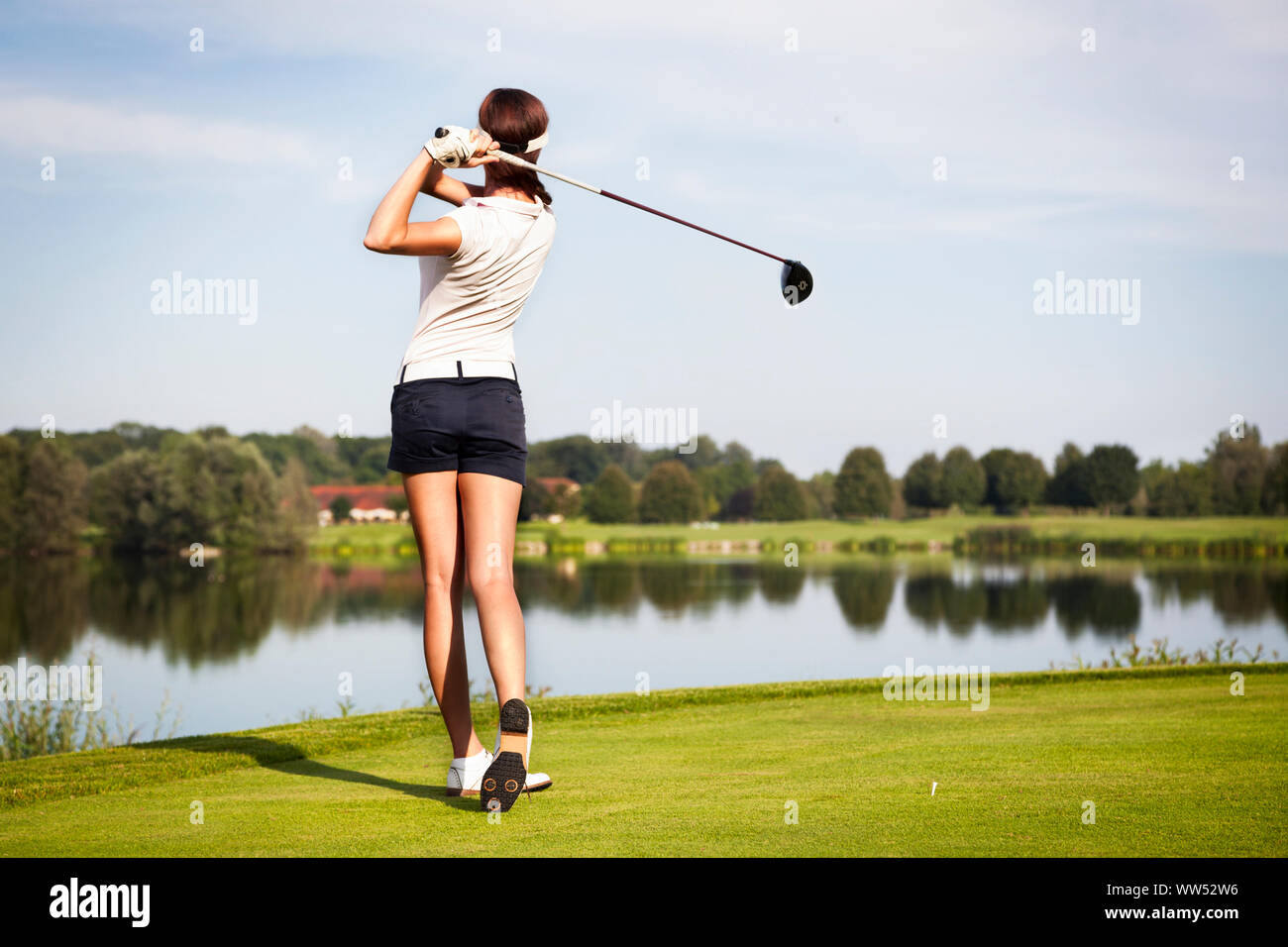Golfspieler abschlagen Stockfoto