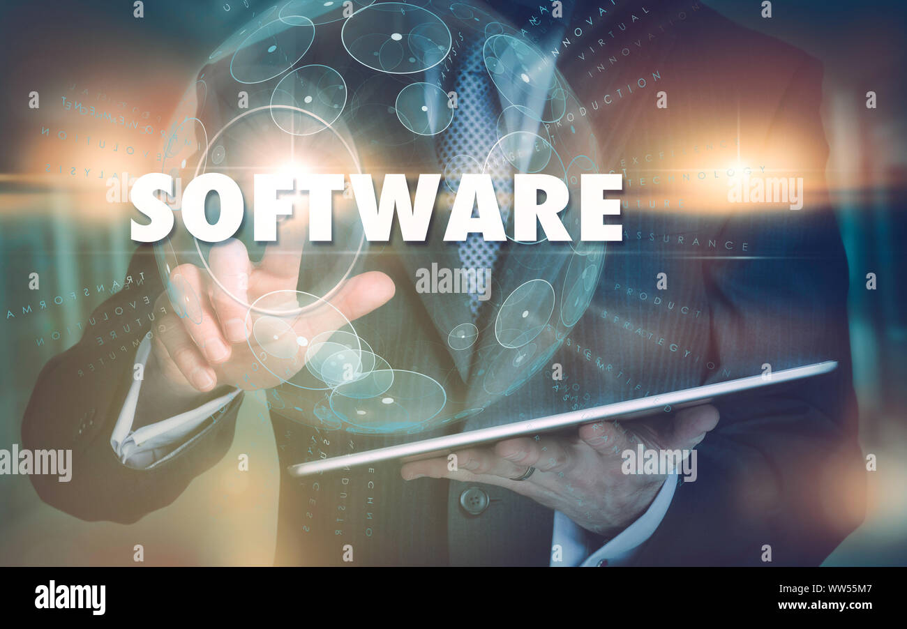 Eine Hand die Auswahl einer Software Business Konzept auf eine futuristische Computer angezeigt. Stockfoto