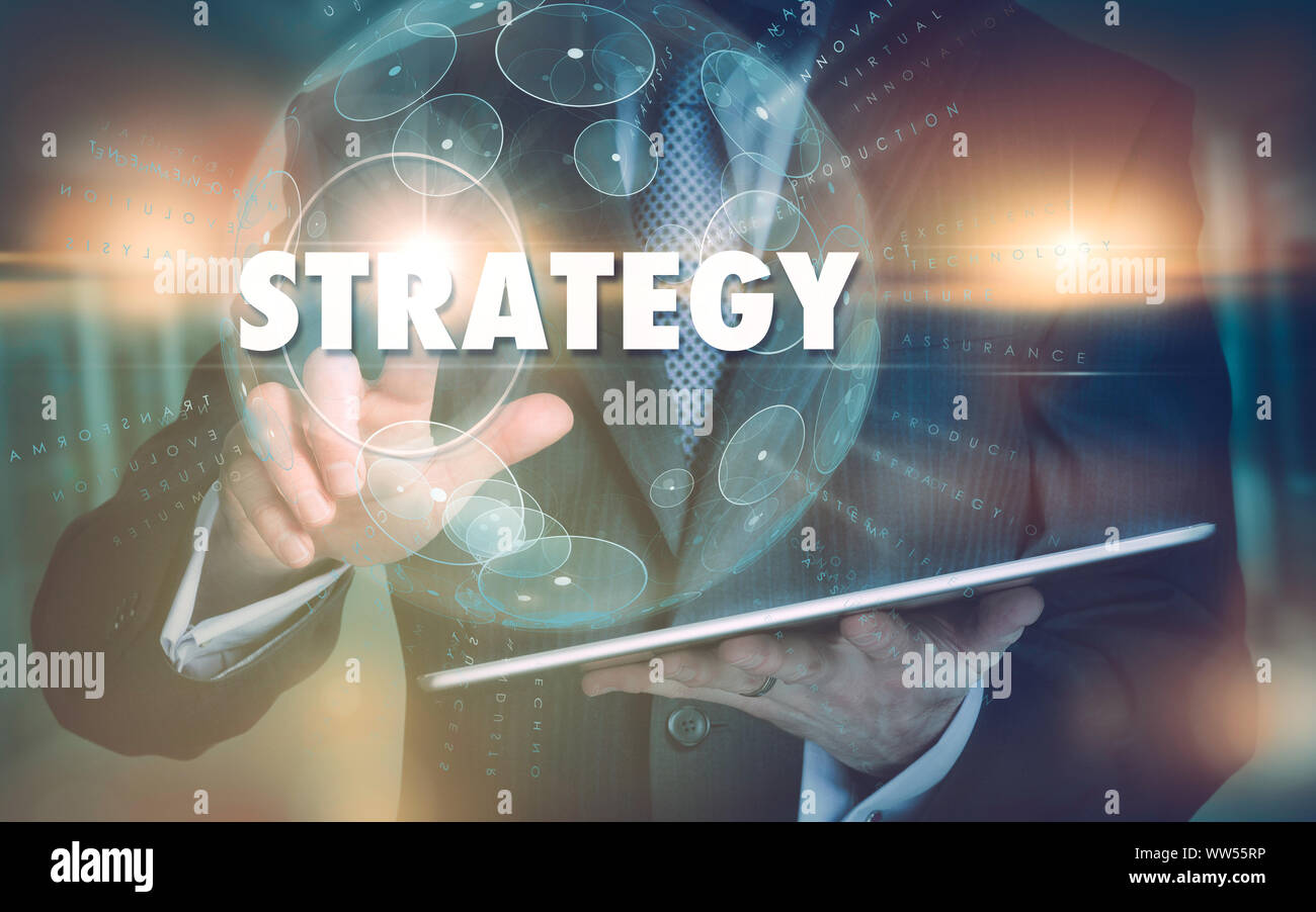 Eine Hand Auswählen einer Strategie Business Konzept auf eine futuristische Computer angezeigt. Stockfoto