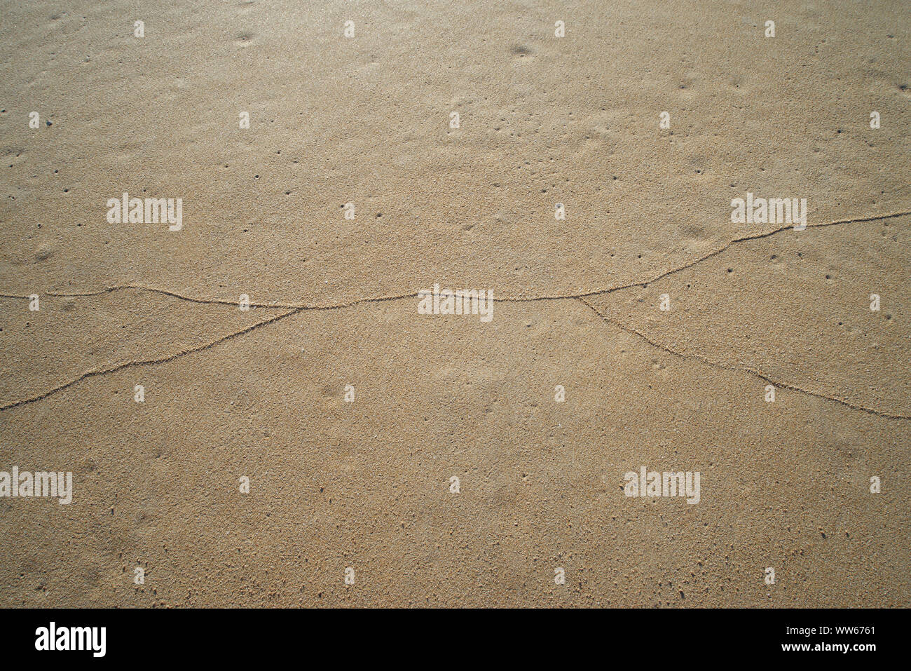 Anschluss/Line in Sand Stockfoto