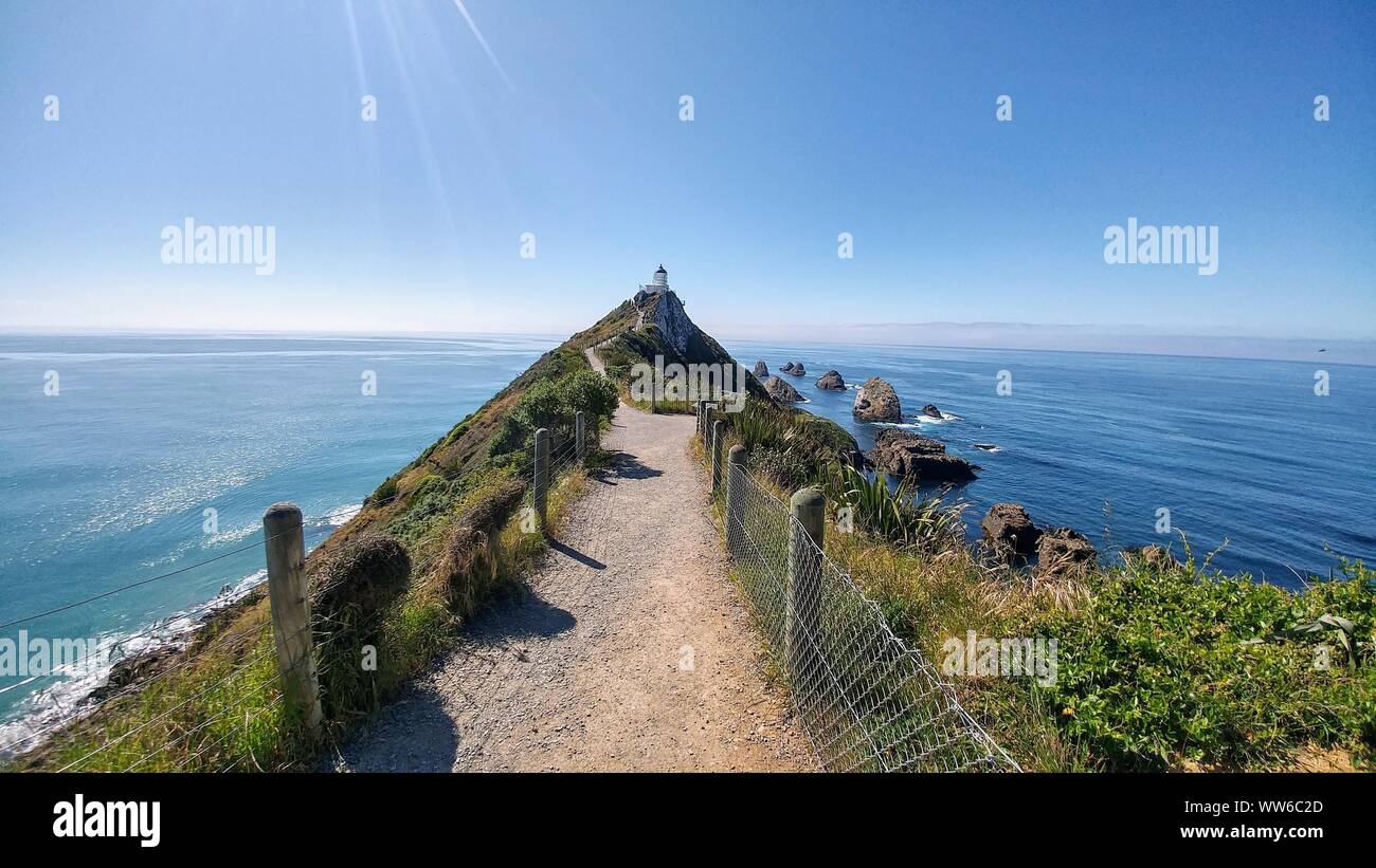 Nugget Point Lighthouse, Kakka Point, Neuseeland Stockfoto