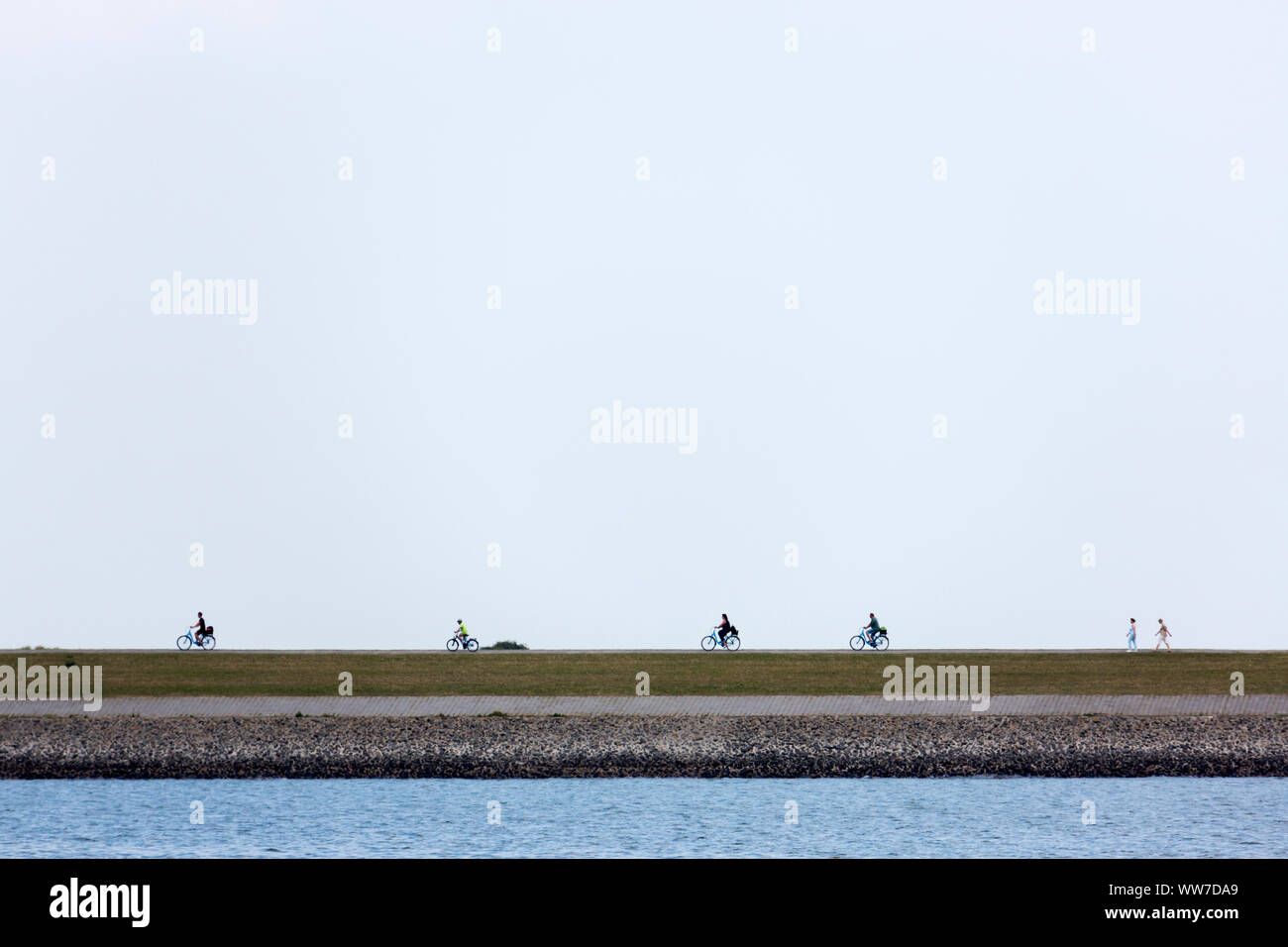 Norderney, Radfahrer, Deich, Watt Stockfoto