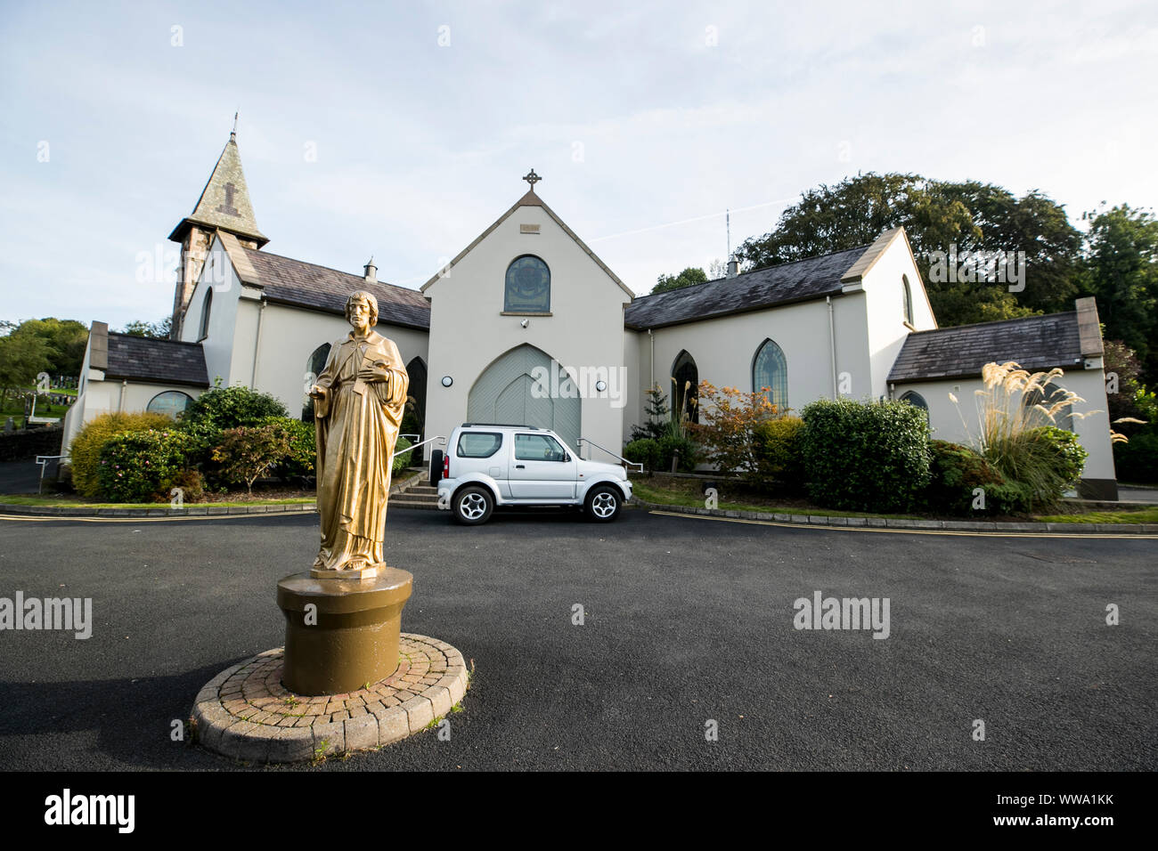 Saint Joseph's Church, Hannahstown in West Belfast, wo es eine Gedenkstätte in den angrenzenden Friedhof zu William Edward Hampton. Herr Hampton, bekannt als Billy, vermachte 1,5 Mio. £ für die irisch-republikanische Partei Sinn Fein. Stockfoto