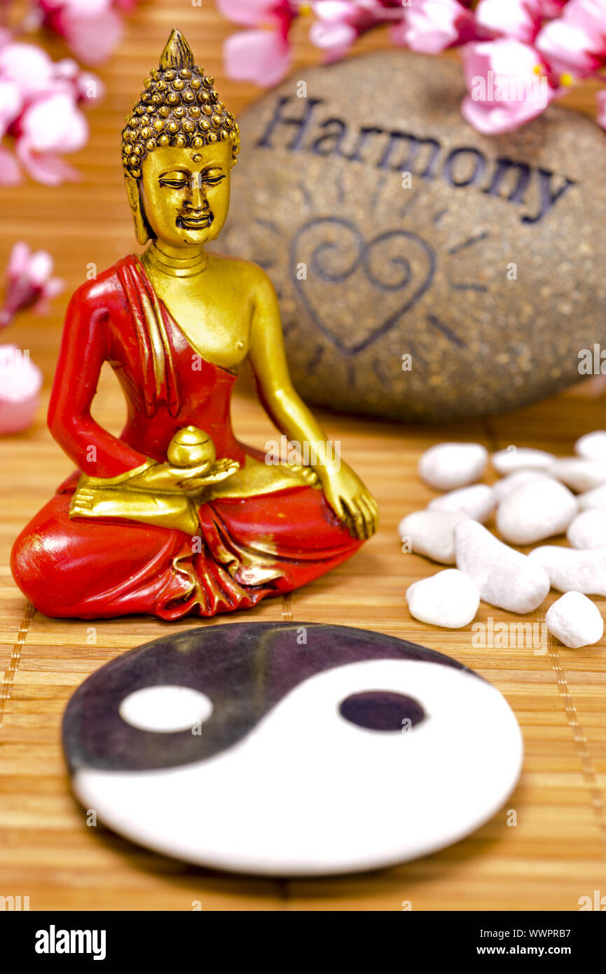 Budhha und Yin Yang Stein Stockfoto