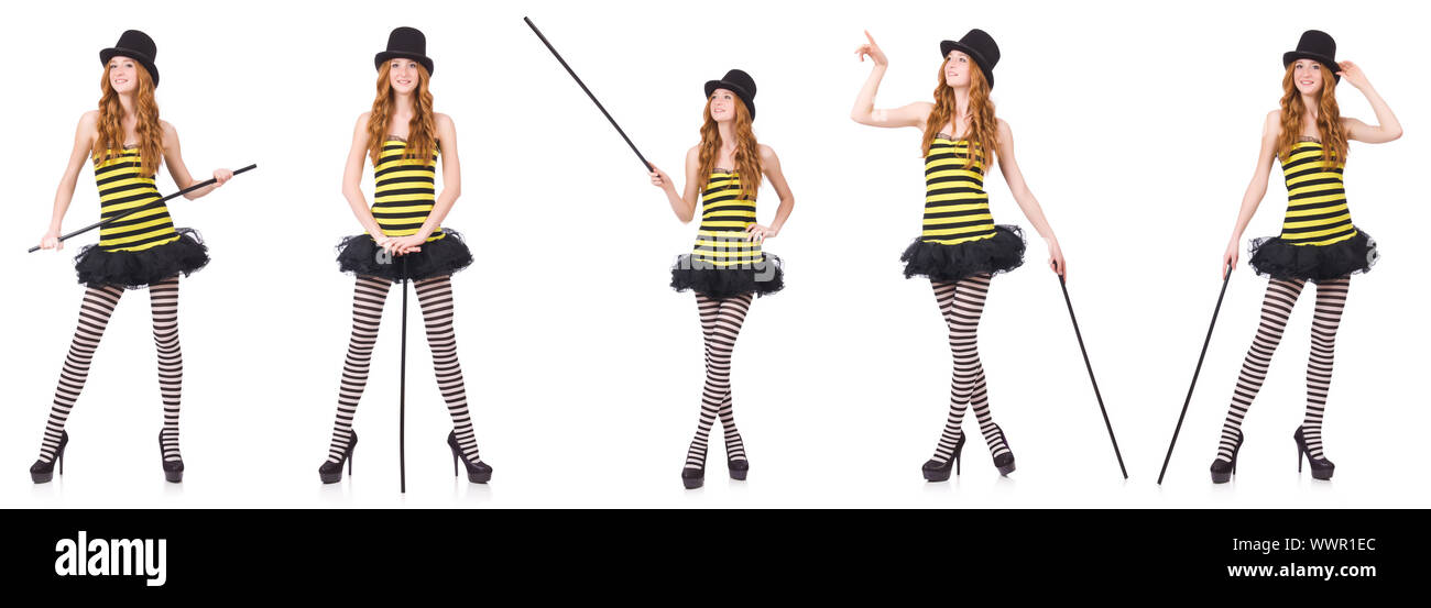 Die ein Mädchen in schwarz-gelb gestreiften Kleid isoliert auf weißem Stockfoto