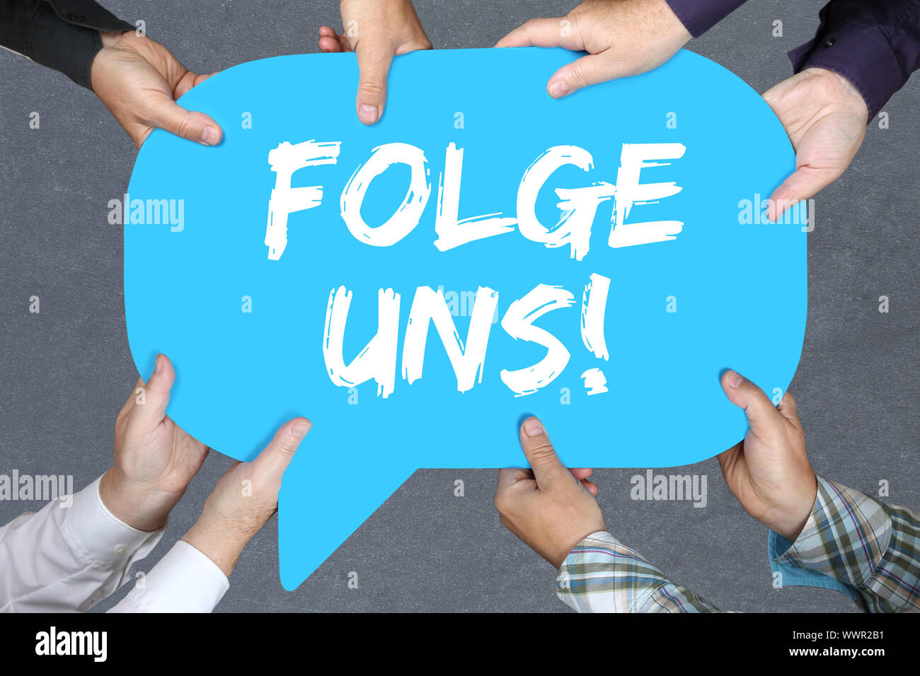 Gruppe Leute halten, folgen Sie uns Internet soziales Netzwerk soziale Netzwerke computer Stockfoto