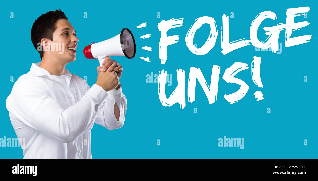 Folgen Sie uns Internet soziales Netzwerk Soziale Netzwerke Soziale Netzwerke computer Megaphon junger Mann Stockfoto