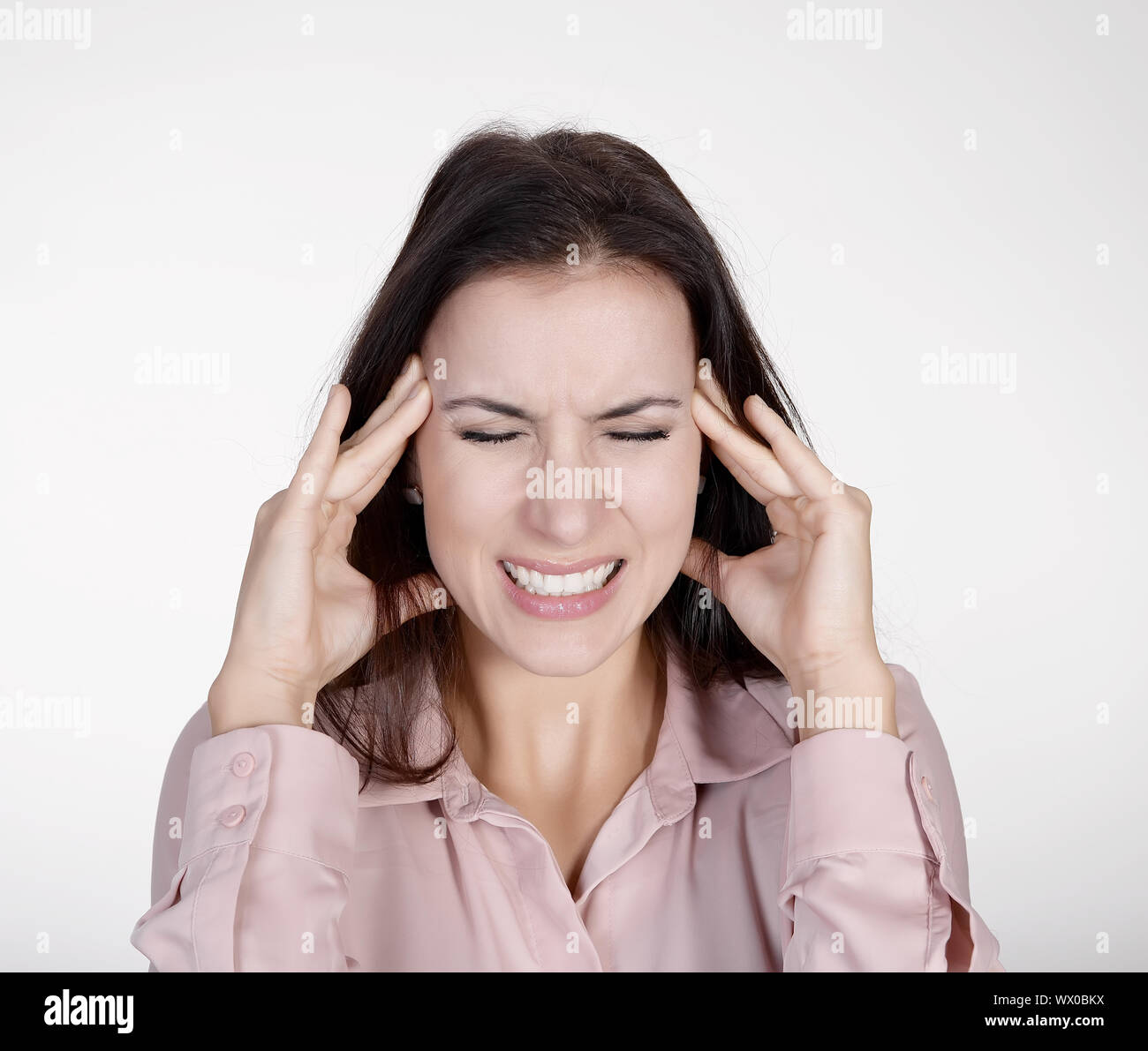 Geschäftsfrau unter Stress im Büro Stockfoto