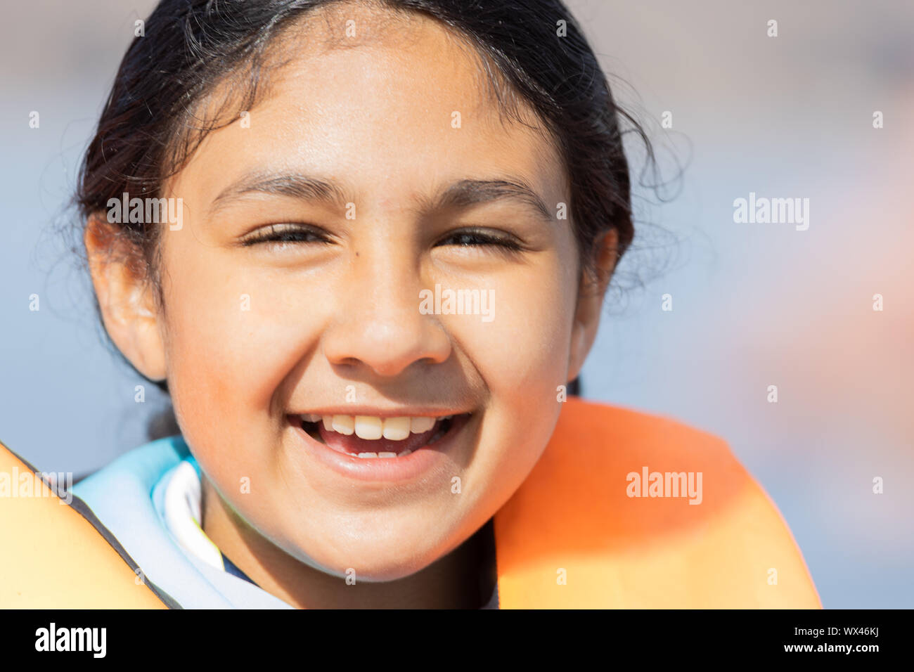 Nahaufnahme Portrait eines Lächelnden Mädchen Stockfoto