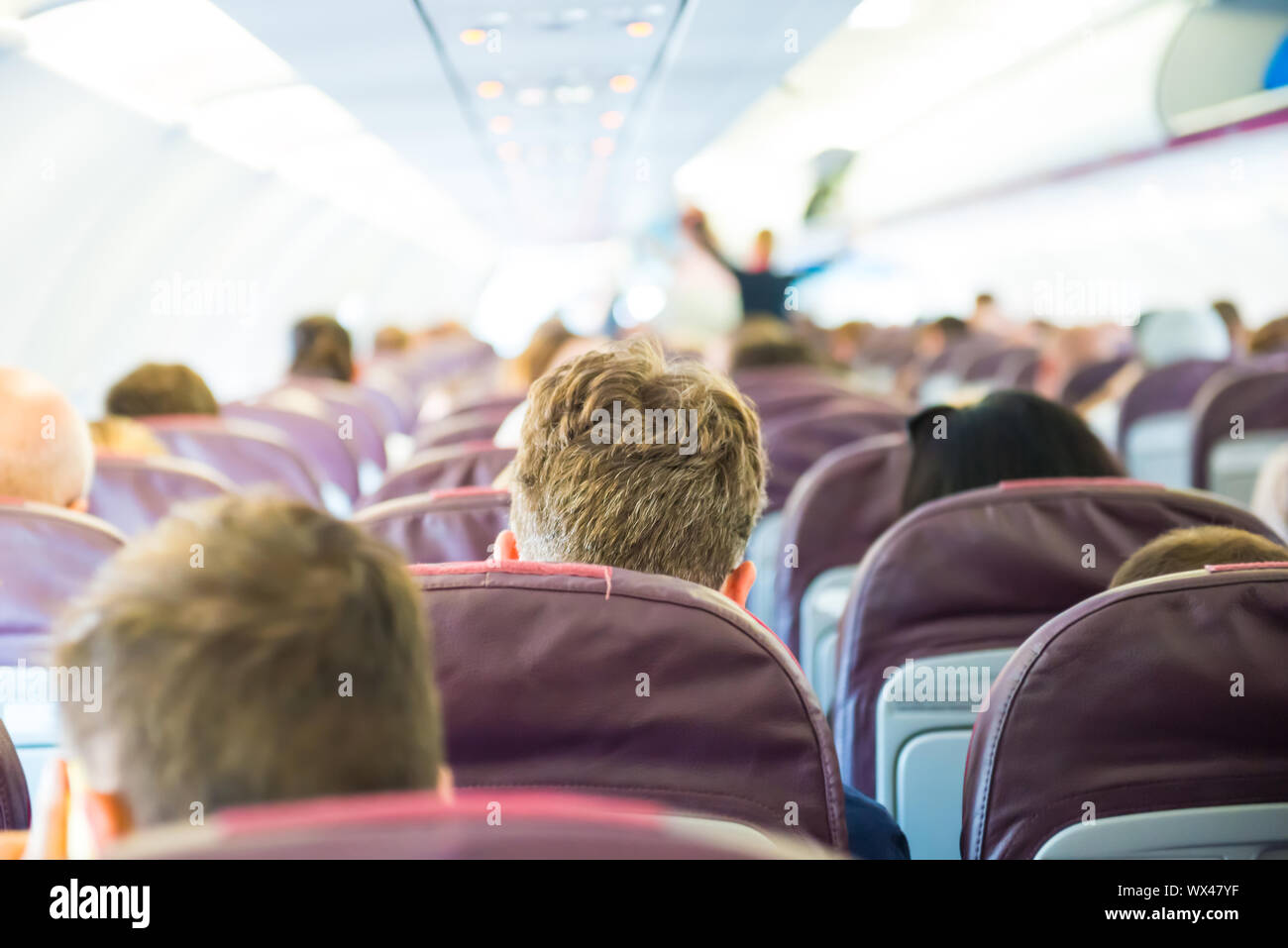 Passagiere im Flugzeug Stockfoto