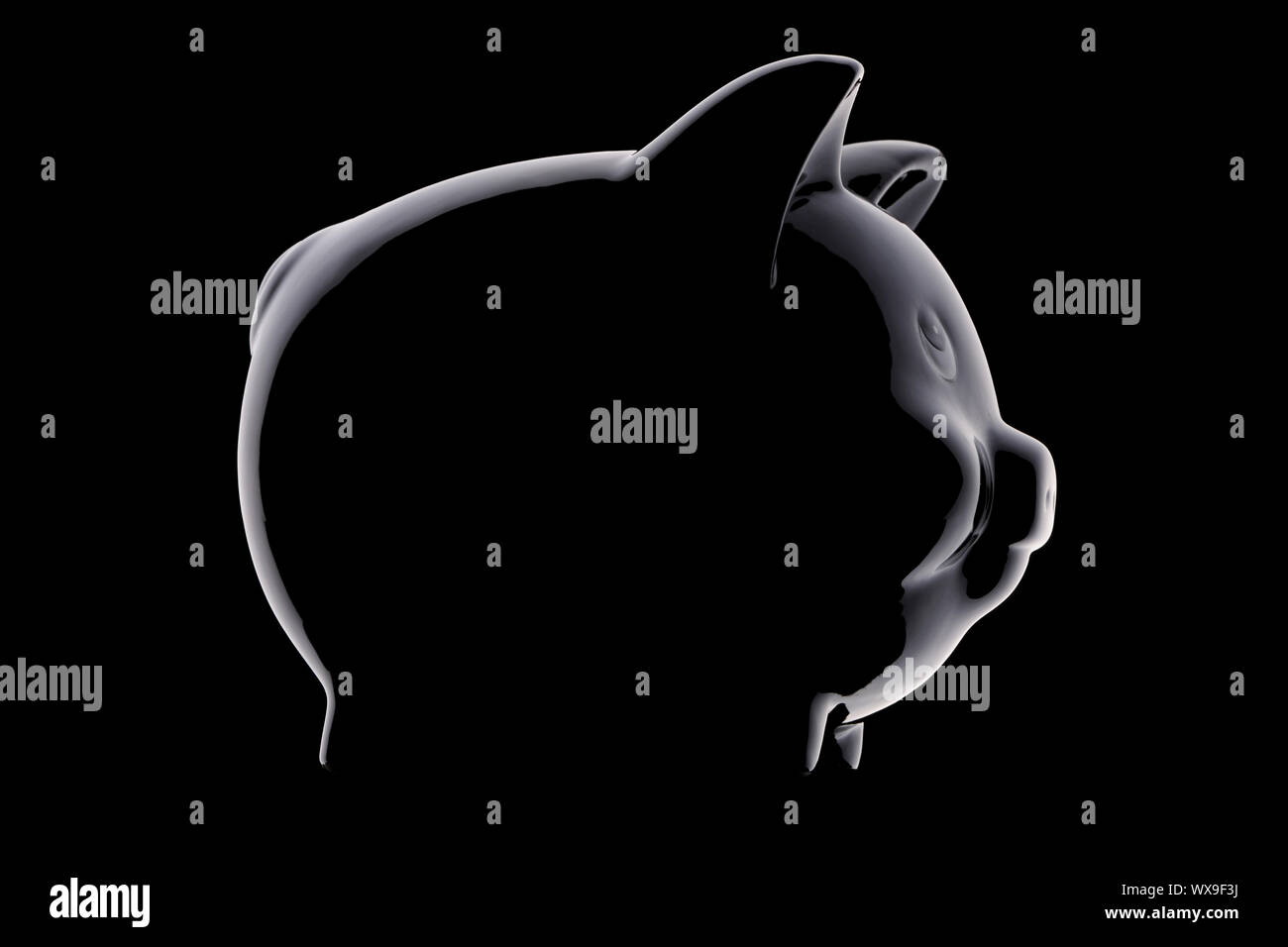 Sparschwein Silhouette über Schwarz Stockfoto