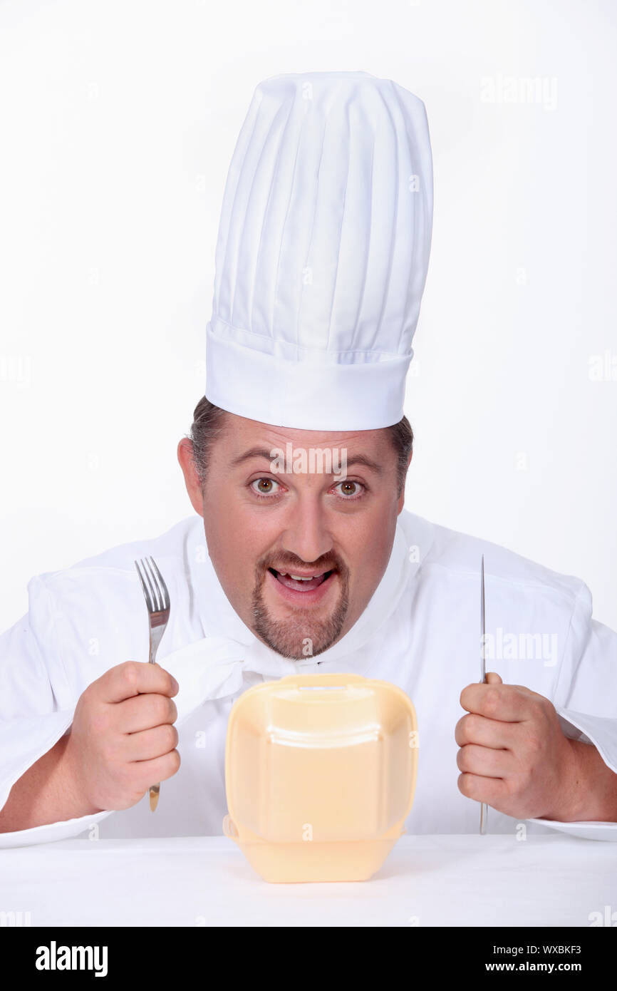 Koch, Hamburger Essen Stockfoto