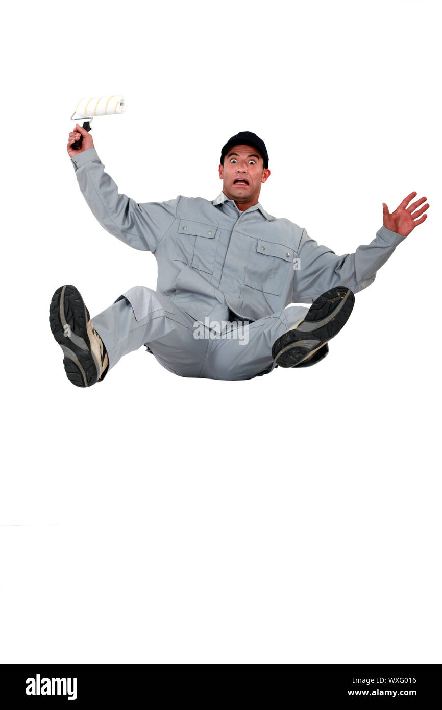 Schockiert Maler nach hinten fallen Stockfoto
