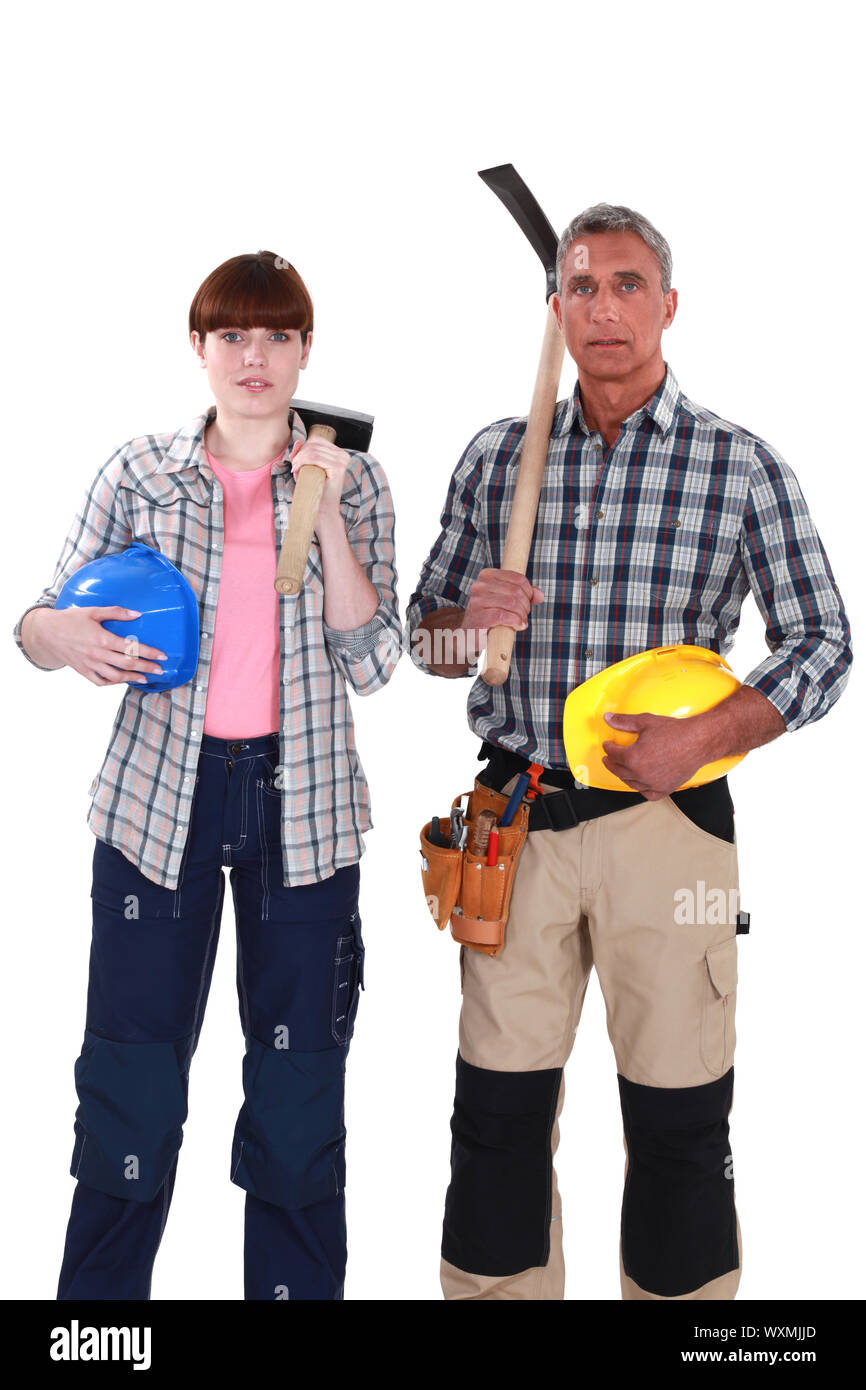 zwei Bauarbeiter posieren zusammen Stockfoto