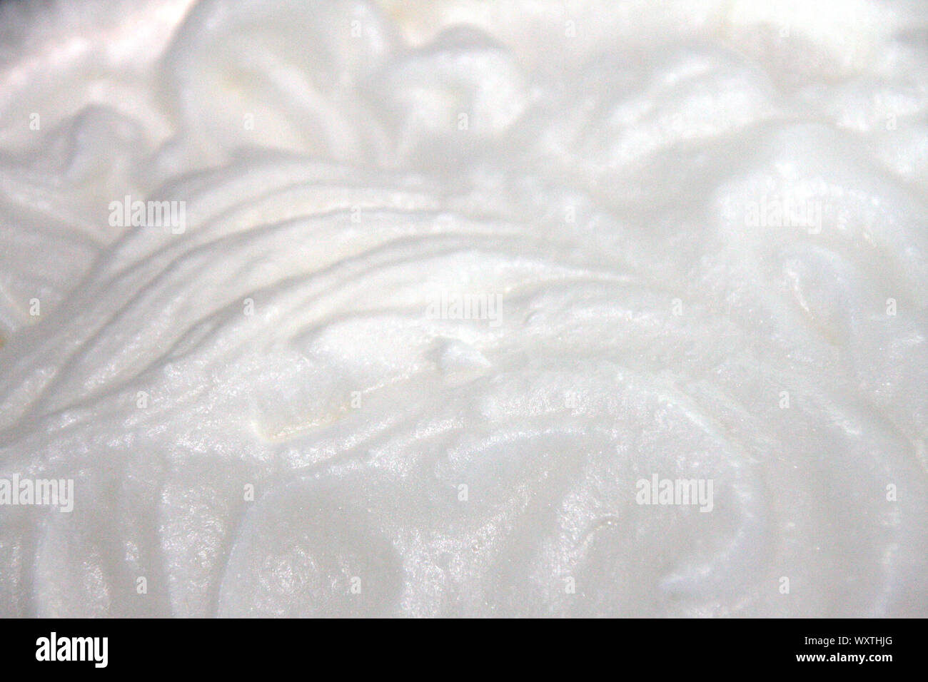Geschlagener Eischnee und Zucker zum Backen cream Topping close up - Eischnee meringue Hintergrund Makro wallpaper Stockfoto