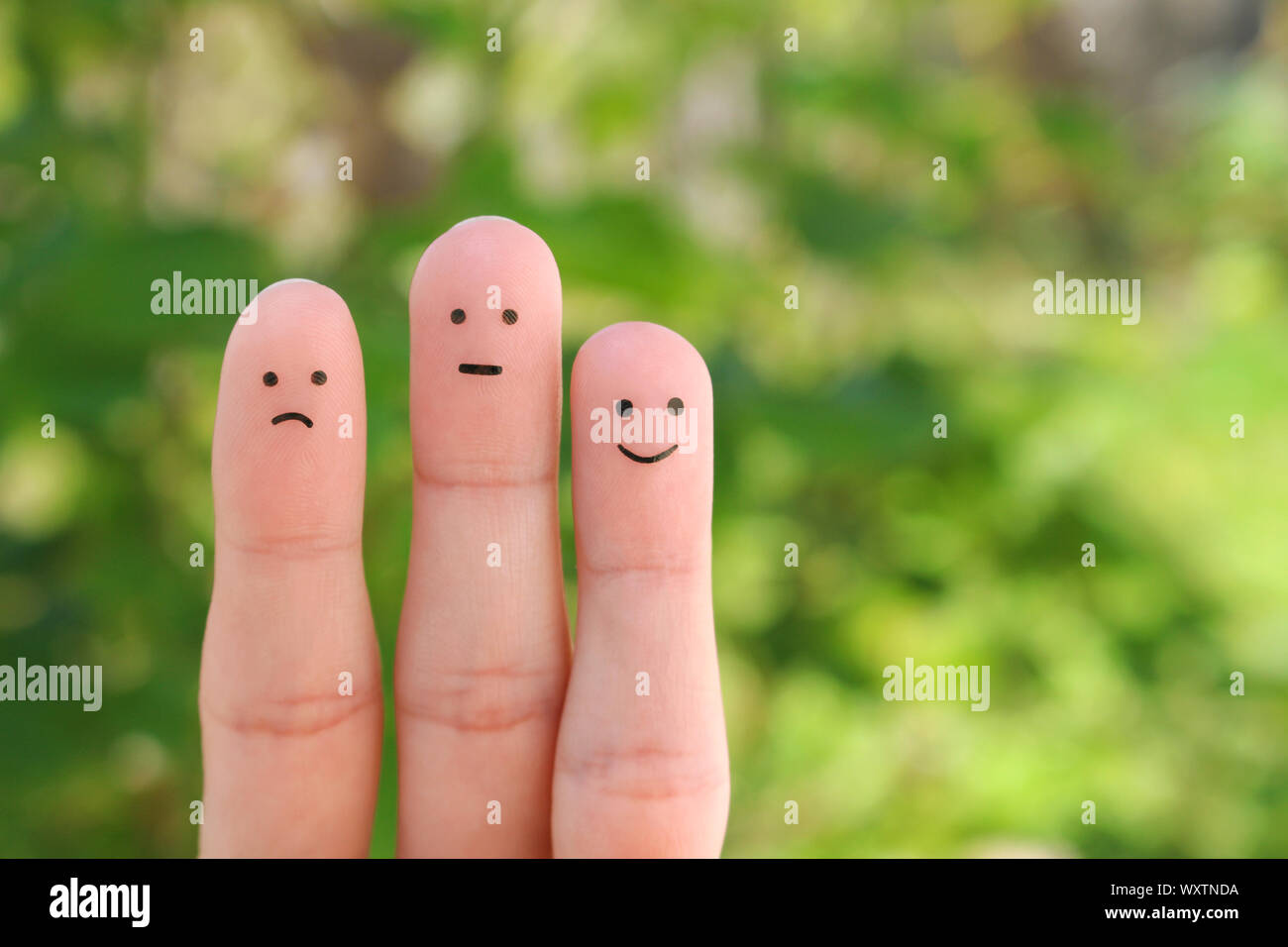 Finger Kunst des Menschen. Konzept der positiven und negativen Emotionen. Stockfoto