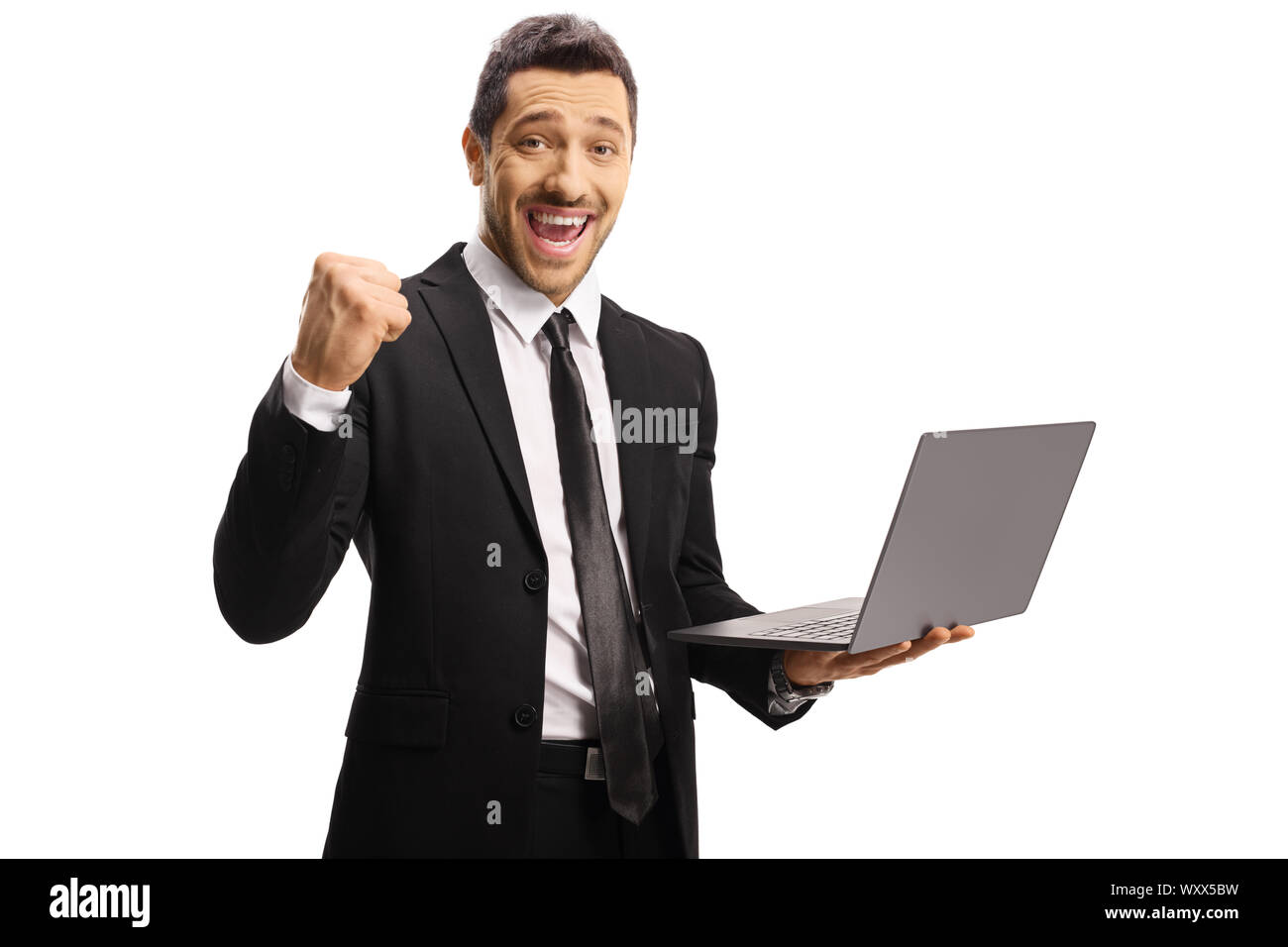 Junge Unternehmer Gestik, die ja mit einem Laptop auf weißem Hintergrund Stockfoto