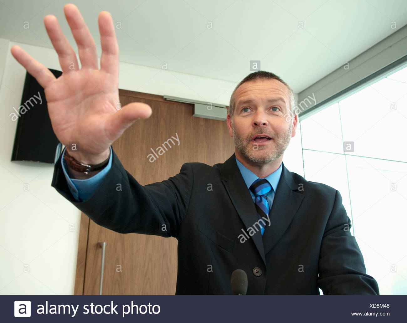 Unternehmensführer hält Rede Stockfoto