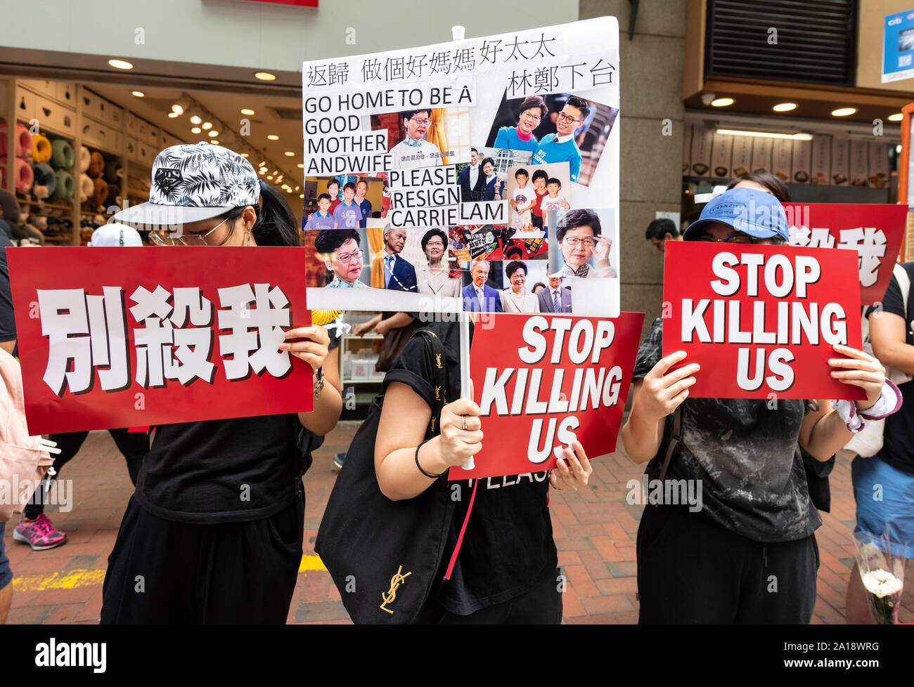 Los manifestantes de marzo en Hong Kong contra el proyecto de ley de extradición presentada por el Jefe del Ejecutivo Carrie Lam. La suspensión de la ley no logra detener la marcha.Jayne Foto de stock
