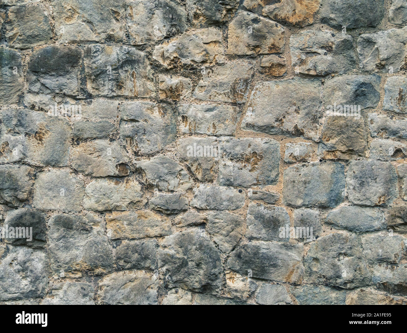 Textura de pared de piedra natural. Antiguo muro de piedra. Foto de stock
