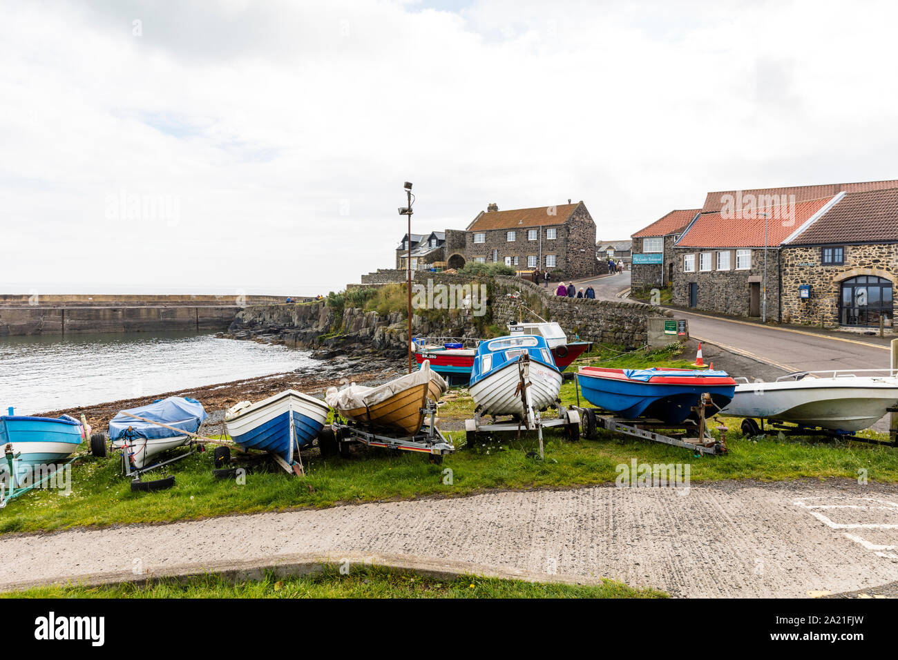 Craster Village, Northumberland uk inglaterra, Craster Harbor, Craster Craster Northumberland, barcos de pesca, barcos Craster. Foto de stock