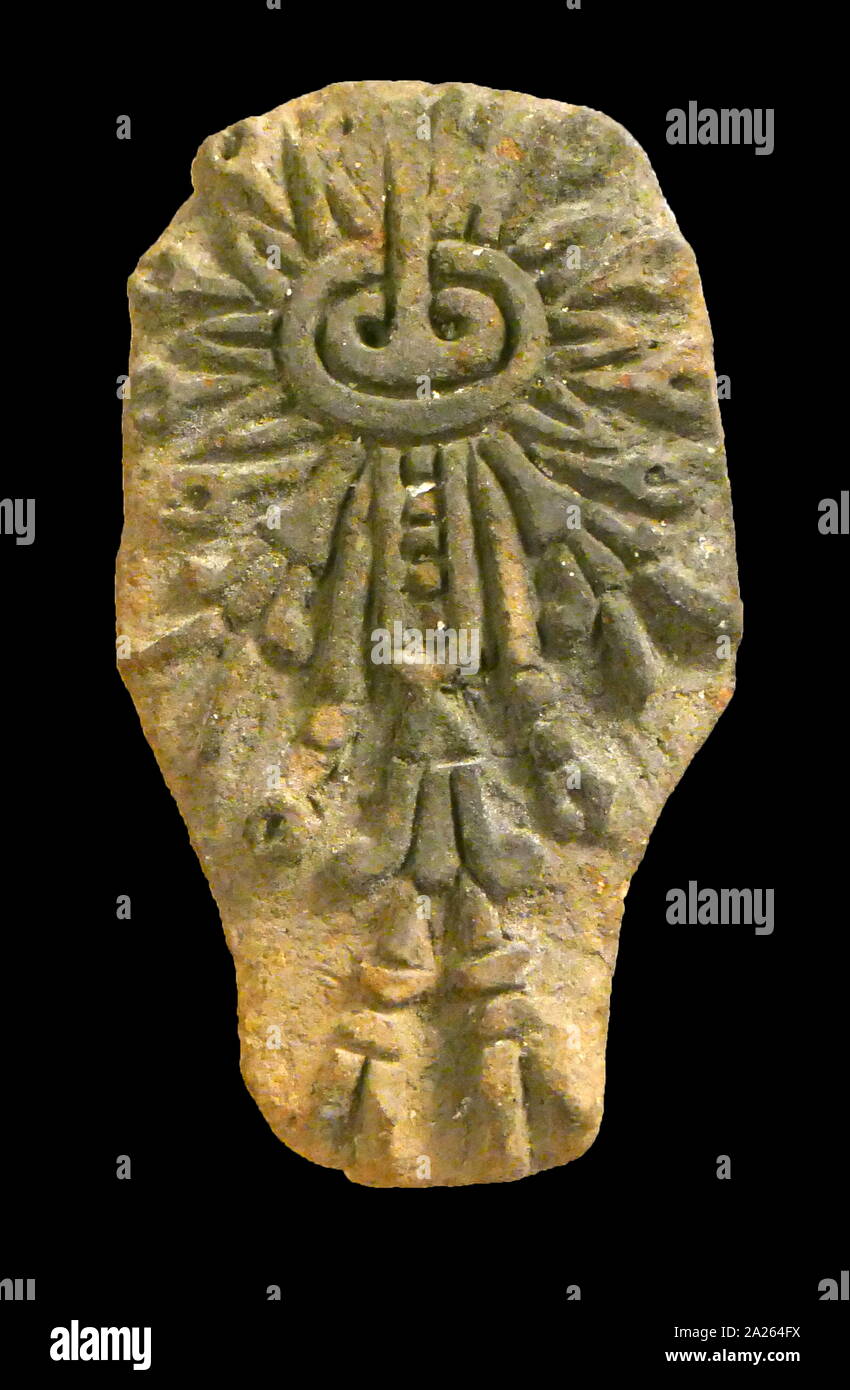 Sello de cerámica; Aztecas, Isla de sacrificios, México. AD 900 1521. La Junta quizá representa una planta de la deidad. Los sellos fueron utilizados para imprimir diseños en los textiles, así como para ornamento del cuerpo Foto de stock