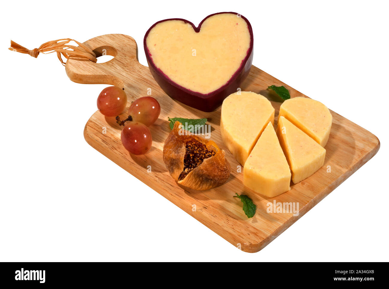 El queso Cheddar en forma de corazón Foto de stock