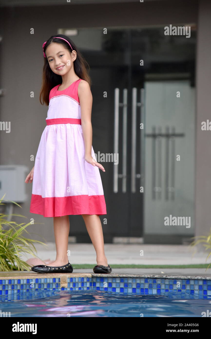 Petite Girl Asiática y felicidad Fotografía de stock - Alamy