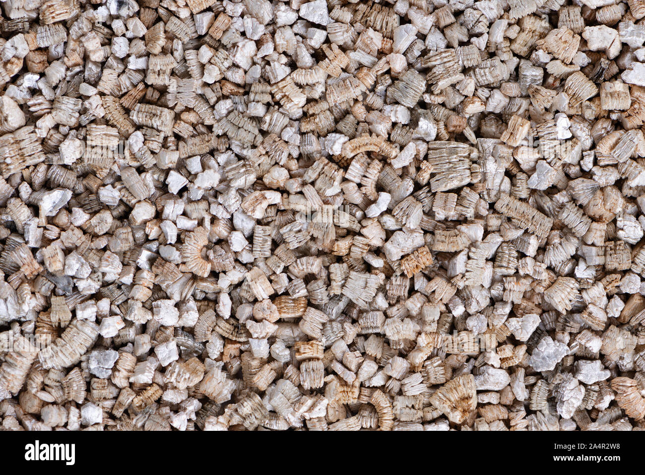 Vermiculita fondo. Exfoliado la Perlita y Vermiculita textura del fondo.  Mineral utilizado en jardinería Fotografía de stock - Alamy